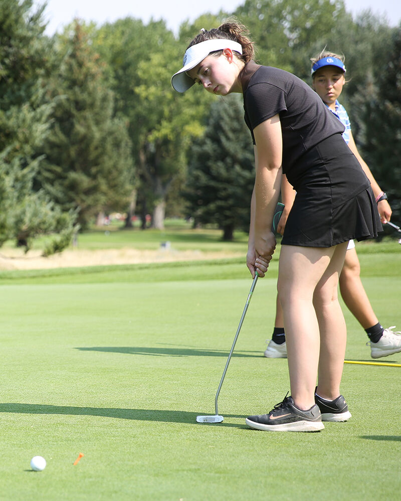 Sydney Hall puts her second to last shot